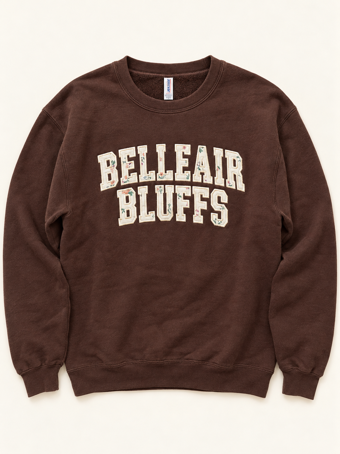Belleair Bluffs Crewneck flat lay showing patterned fabric applique with stitched edges